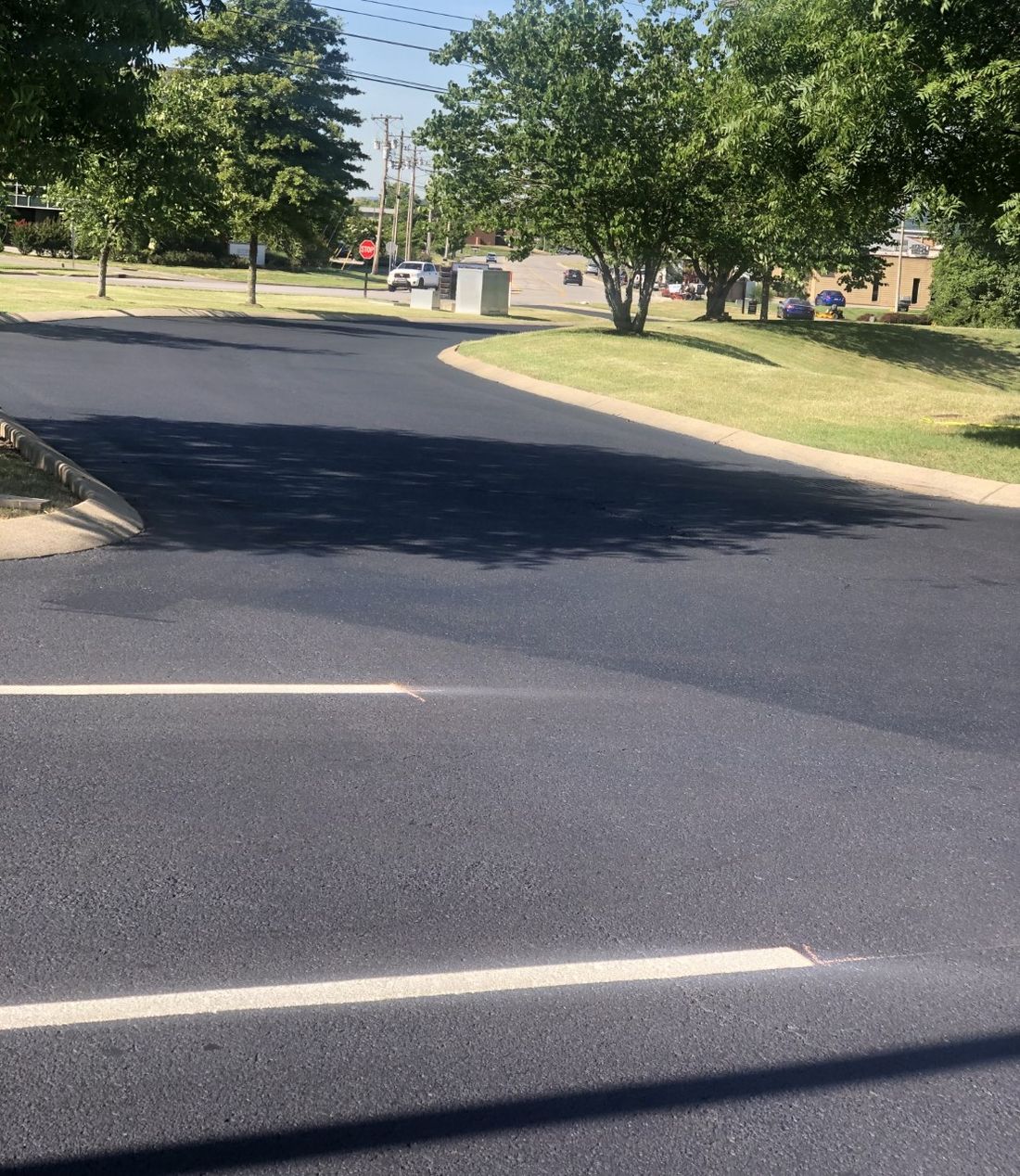 New asphalt paving on a commercial drive