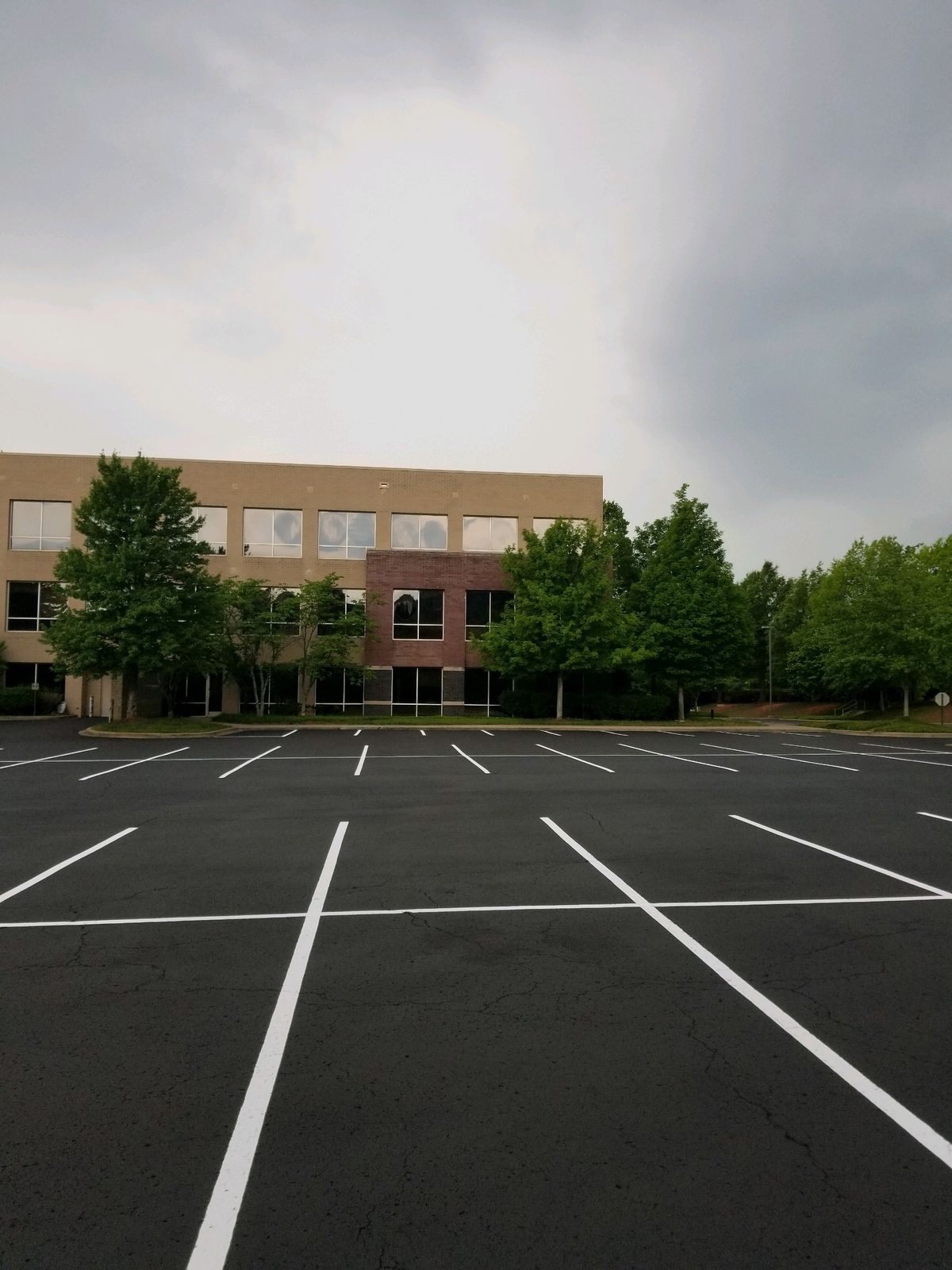 Fresh asphalt lot at an office building