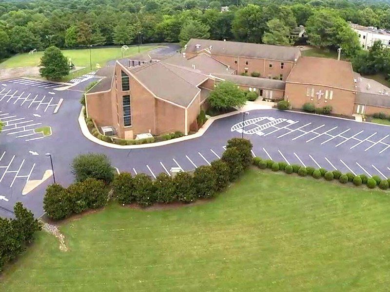 Aerial view of church parking lot with new striping